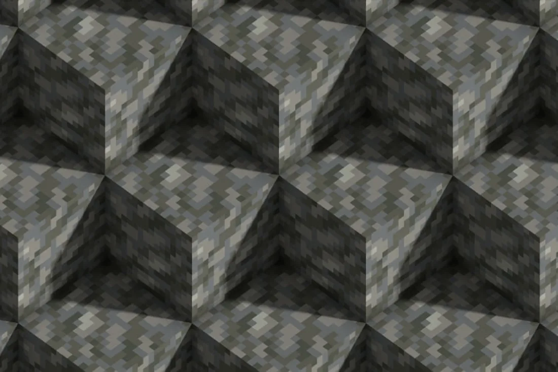 Official Minecraft close-up of gray tuff blocks showing their mottled texture